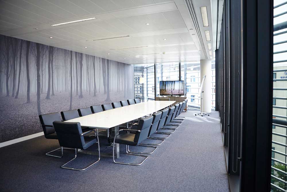 board room with tree wallpaper in stylish london offices by airey spaces