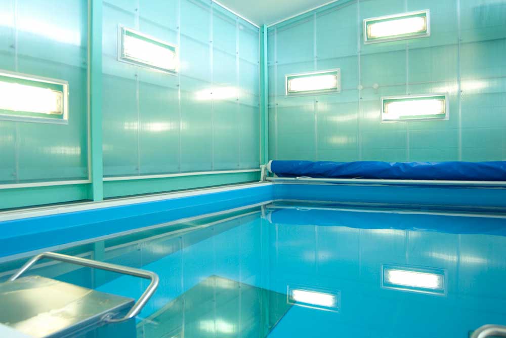 turquoise and blue current swimming pool by airey spaces
