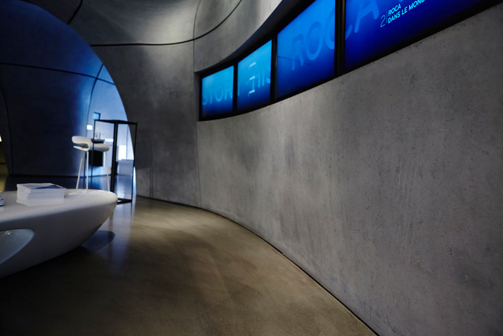 zaha hadid grey curved interior showroom and screens of roca gallery london by airey spaces