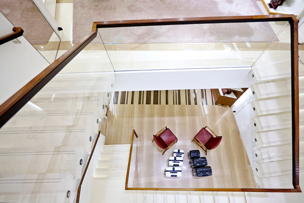 stair case in Longchamp store on New Bond Street by Airey Spaces