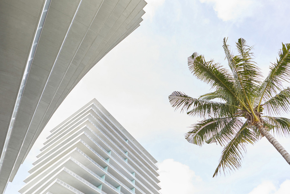 concrete balconies of twist modern apartment buildings in Miami by Airey Spaces